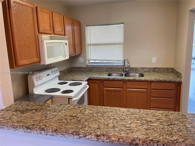 8325 Sunrise Lakes Blvd Unit 305, Sunrise, FL 33322 - kitchen with white appliances, brown cabinets, and stone counters