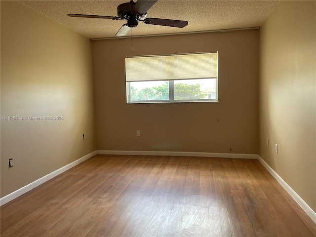 8325 Sunrise Lakes Blvd Unit 305, Sunrise, FL 33322 - spare room with wood finished floors, a textured ceiling, and a ceiling fan