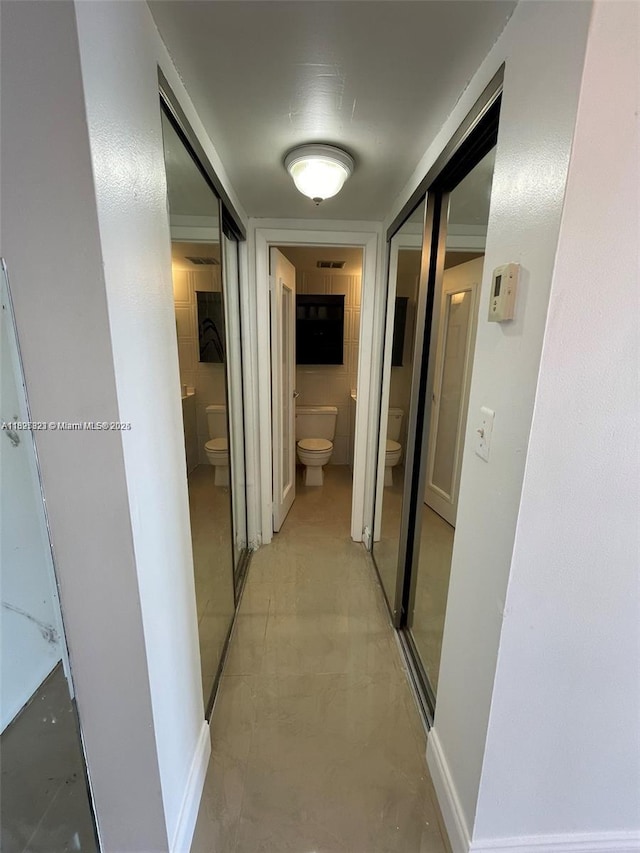 16465 NE 22nd Ave Unit 417, North Miami Beach, FL 33160 - hall featuring baseboards