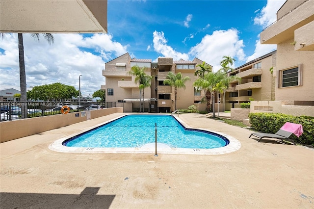 10700 SW 108th Ave Unit C316, Miami, FL 33176 - community pool with a patio area and a residential view