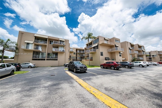 10700 SW 108th Ave Unit C316, Miami, FL 33176 - view of apartment building / complex featuring uncovered parking