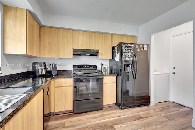 4764 Greentree Cres Unit A, Boynton Beach, FL 33436 - kitchen with black appliances, under cabinet range hood, light wood-style floors, dark stone counters, and light brown cabinetry
