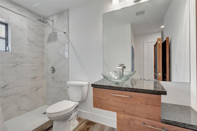 4764 Greentree Cres Unit A, Boynton Beach, FL 33436 - full bathroom featuring vanity, a marble finish shower, and wood finished floors