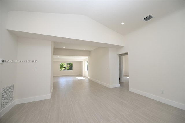 2949 SW 14th St, Miami, FL 33145 - unfurnished room featuring vaulted ceiling and recessed lighting