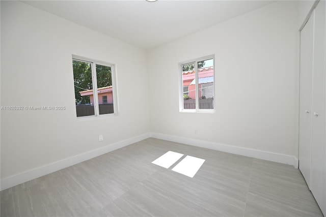 2949 SW 14th St, Miami, FL 33145 - unfurnished room featuring baseboards