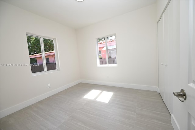 2949 SW 14th St, Miami, FL 33145 - spare room featuring baseboards