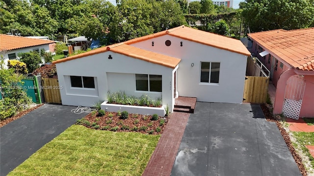 2949 SW 14th St, Miami, FL 33145 - mediterranean / spanish home with stucco siding and a gate