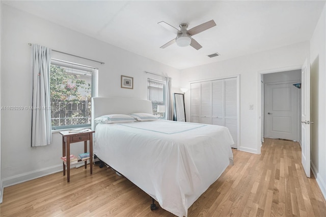 443 SW 18th Rd, Miami, FL 33129 - bedroom featuring light wood-style flooring, a closet, and ceiling fan