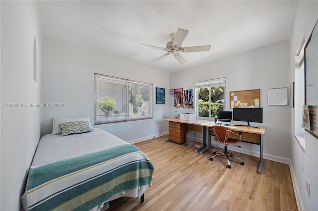 443 SW 18th Rd, Miami, FL 33129 - bedroom featuring a desk, light wood-style floors, and a ceiling fan
