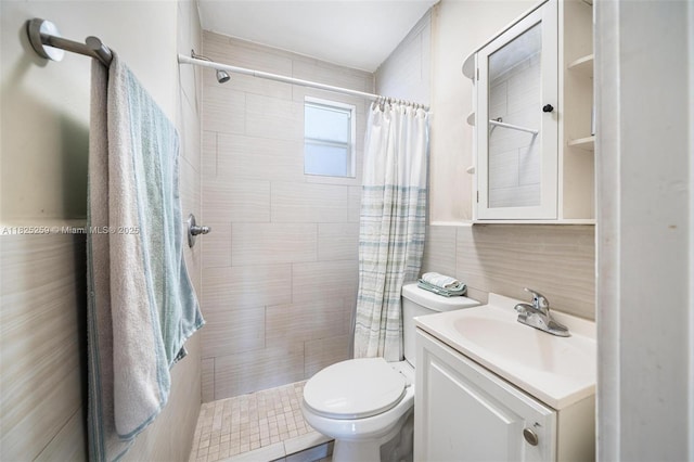 443 SW 18th Rd, Miami, FL 33129 - full bathroom featuring vanity, tiled shower, and tile walls