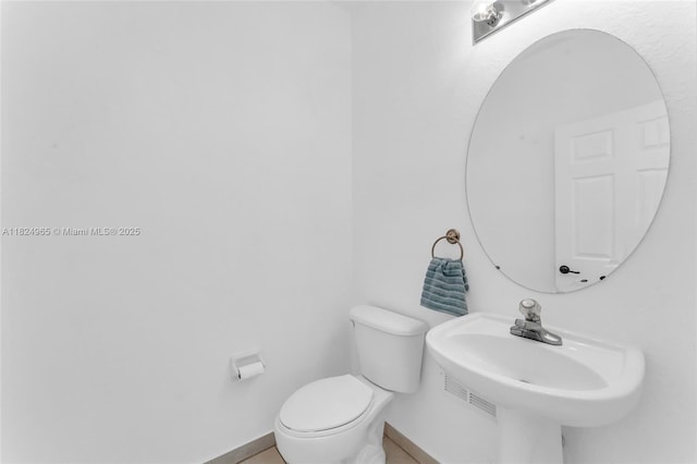 8081 NW 107th Ct, Doral, FL 33178 - bathroom with toilet and baseboards