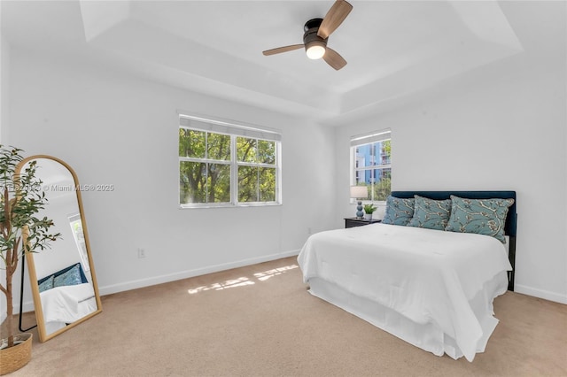 8081 NW 107th Ct, Doral, FL 33178 - carpeted bedroom with a raised ceiling and ceiling fan