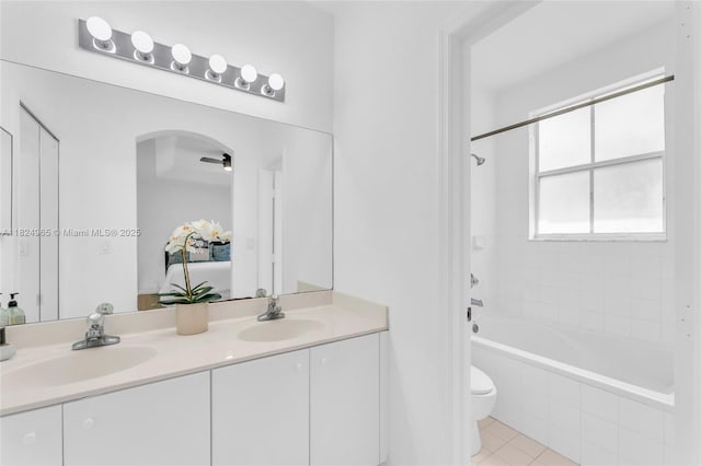 8081 NW 107th Ct, Doral, FL 33178 - bathroom featuring double vanity, tile patterned floors, and tiled shower / bath combo