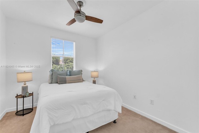 8081 NW 107th Ct, Doral, FL 33178 - bedroom with light carpet and ceiling fan