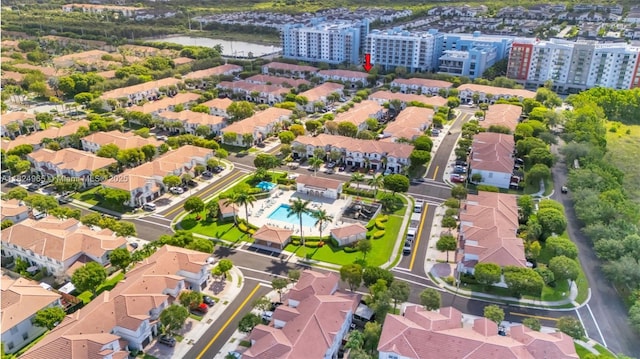 8081 NW 107th Ct, Doral, FL 33178 - aerial view of residential area featuring a pool and a large body of water