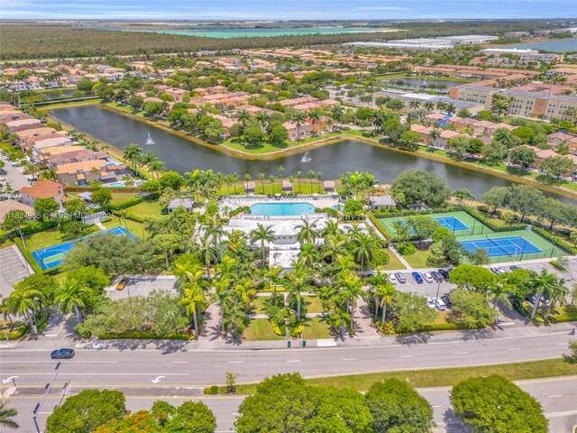8081 NW 107th Ct, Doral, FL 33178 - bird's eye view of a nearby body of water and a pool area