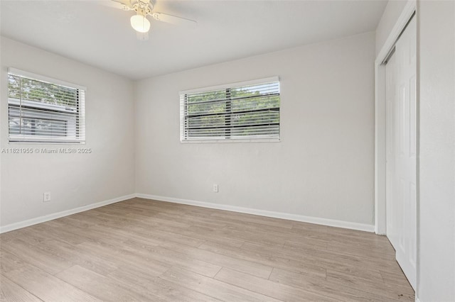 2817 SW 8th St, Fort Lauderdale, FL 33312 - unfurnished bedroom featuring light wood-style floors, a closet, and a ceiling fan