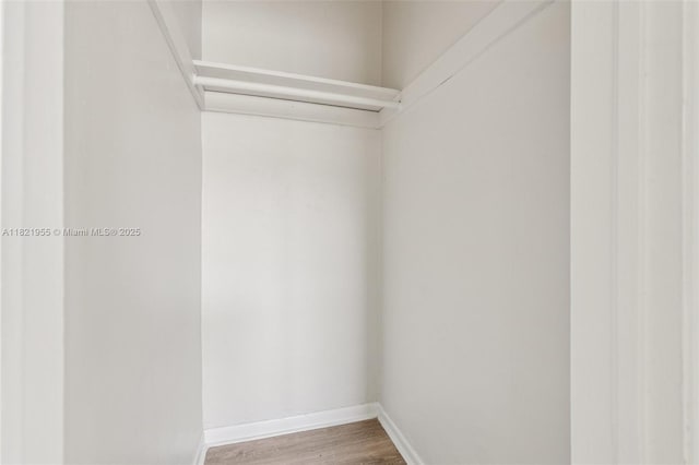 2817 SW 8th St, Fort Lauderdale, FL 33312 - walk in closet featuring wood finished floors