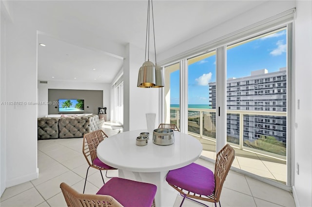 9601 Collins Ave Unit 809, Bal Harbour, FL 33154 - dining space featuring light tile patterned floors and recessed lighting