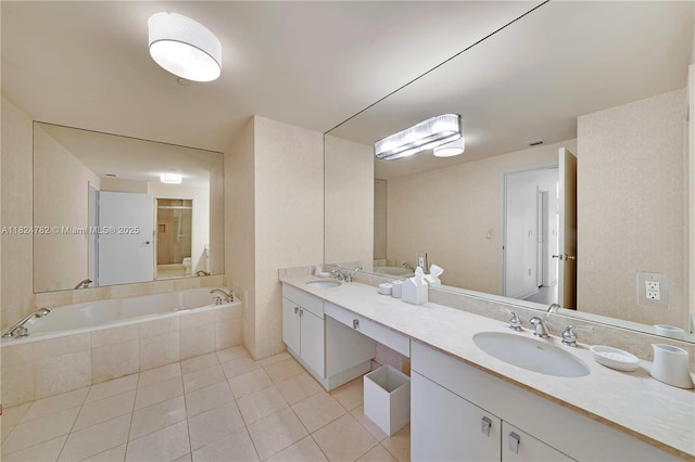9601 Collins Ave Unit 809, Bal Harbour, FL 33154 - bathroom with tile patterned flooring, double vanity, and a garden tub