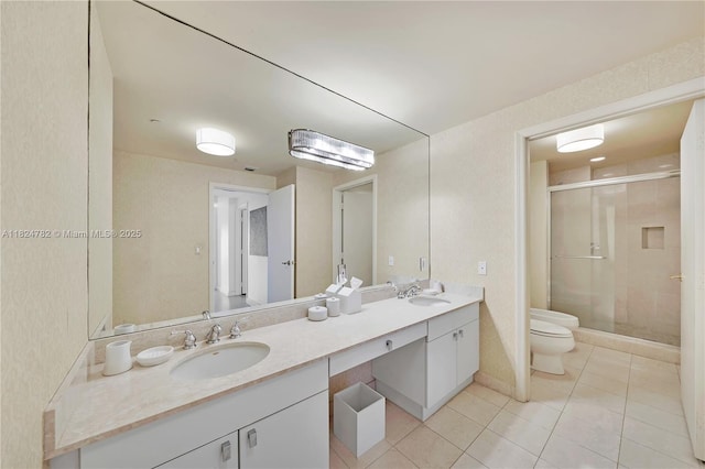 9601 Collins Ave Unit 809, Bal Harbour, FL 33154 - bathroom featuring double vanity, a shower stall, and tile patterned floors