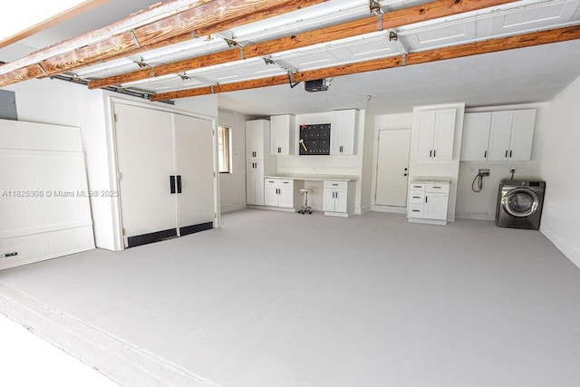 3420 NW 21st Ct, Coconut Creek, FL 33066 - garage featuring washer / clothes dryer and a garage door opener