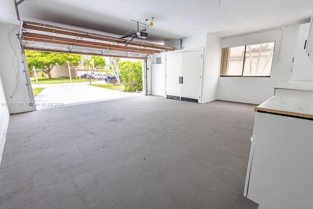 3420 NW 21st Ct, Coconut Creek, FL 33066 - garage featuring a garage door opener