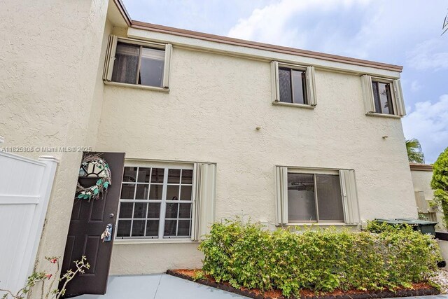 3420 NW 21st Ct, Coconut Creek, FL 33066 - back of property featuring stucco siding
