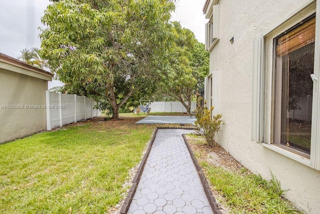3420 NW 21st Ct, Coconut Creek, FL 33066 - fenced backyard with a patio