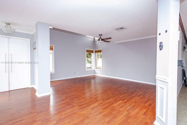 3420 NW 21st Ct, Coconut Creek, FL 33066 - empty room featuring light wood finished floors, crown molding, a textured ceiling, and ceiling fan
