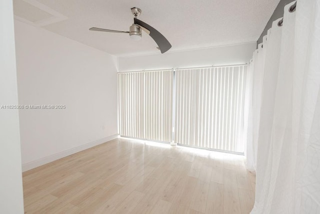 3420 NW 21st Ct, Coconut Creek, FL 33066 - spare room with a ceiling fan and light wood-style flooring
