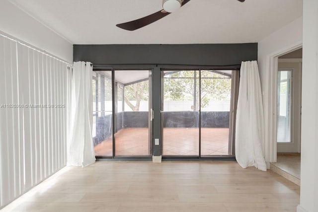 3420 NW 21st Ct, Coconut Creek, FL 33066 - unfurnished room featuring a ceiling fan and wood finished floors
