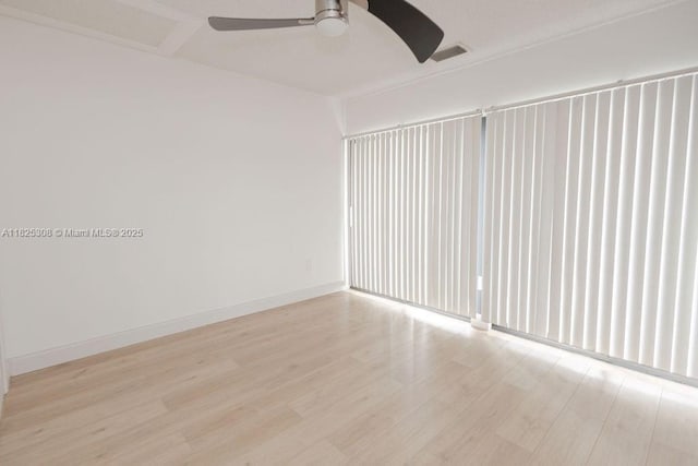 3420 NW 21st Ct, Coconut Creek, FL 33066 - unfurnished room with ceiling fan and wood finished floors