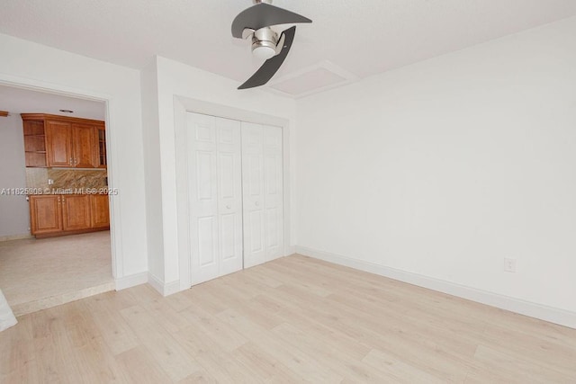 3420 NW 21st Ct, Coconut Creek, FL 33066 - unfurnished bedroom featuring light wood finished floors, a closet, and ceiling fan