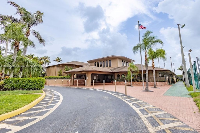 3420 NW 21st Ct, Coconut Creek, FL 33066 - view of asphalt road featuring street lighting