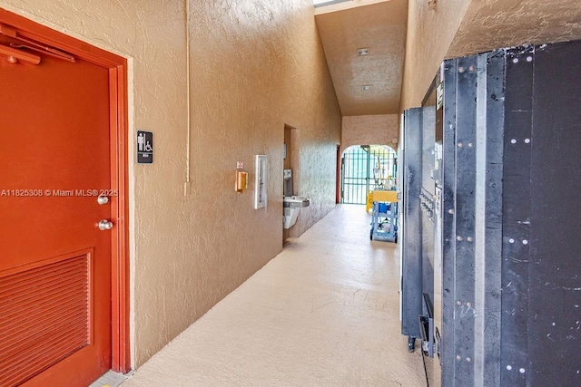 3420 NW 21st Ct, Coconut Creek, FL 33066 - corridor with a textured wall