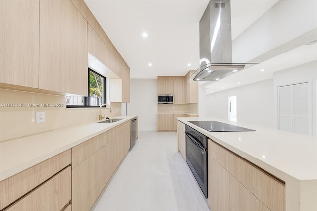 1344 SW 18th St, Miami, FL 33145 - kitchen featuring light brown cabinetry, stainless steel appliances, and modern cabinets