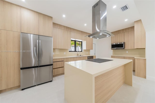 1344 SW 18th St, Miami, FL 33145 - kitchen featuring stainless steel appliances, island range hood, modern cabinets, light brown cabinetry, and recessed lighting