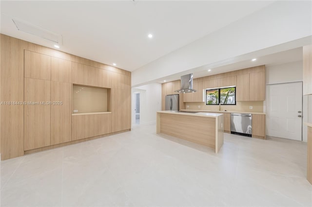 1344 SW 18th St, Miami, FL 33145 - kitchen featuring appliances with stainless steel finishes, modern cabinets, wall chimney exhaust hood, light brown cabinetry, and a center island