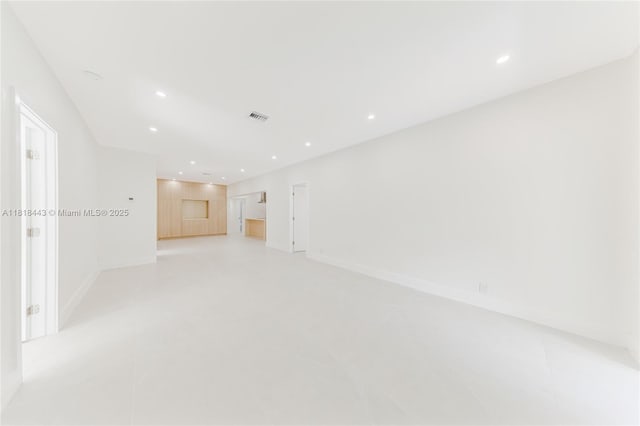 1344 SW 18th St, Miami, FL 33145 - unfurnished living room featuring recessed lighting and baseboards