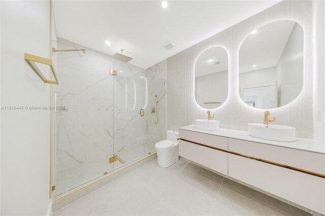 1344 SW 18th St, Miami, FL 33145 - bathroom featuring double vanity, a marble finish shower, and tile patterned flooring