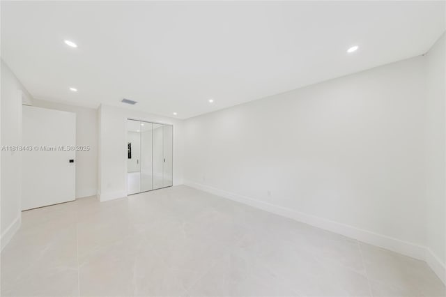 1344 SW 18th St, Miami, FL 33145 - empty room featuring recessed lighting and light tile patterned flooring