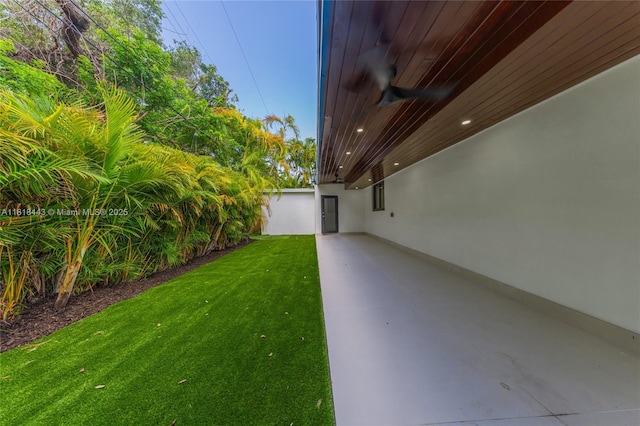 1344 SW 18th St, Miami, FL 33145 - view of grassy yard featuring a patio