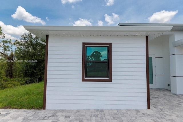 719 Almelia St E, Lehigh Acres, FL 33974 - view of side of home