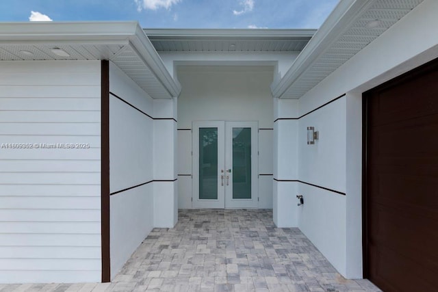 719 Almelia St E, Lehigh Acres, FL 33974 - property entrance featuring french doors