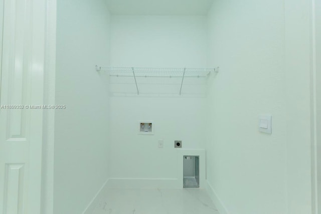 719 Almelia St E, Lehigh Acres, FL 33974 - washroom featuring electric dryer hookup, hookup for a washing machine, and marble look tiles