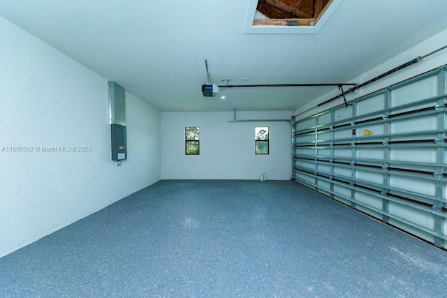 719 Almelia St E, Lehigh Acres, FL 33974 - garage with a garage door opener and electric panel
