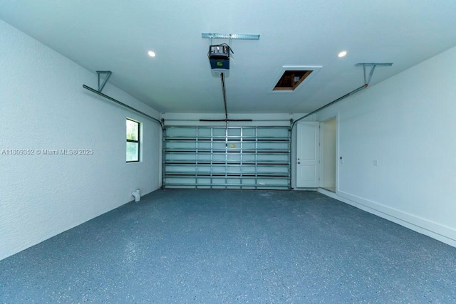 719 Almelia St E, Lehigh Acres, FL 33974 - garage featuring a garage door opener and recessed lighting