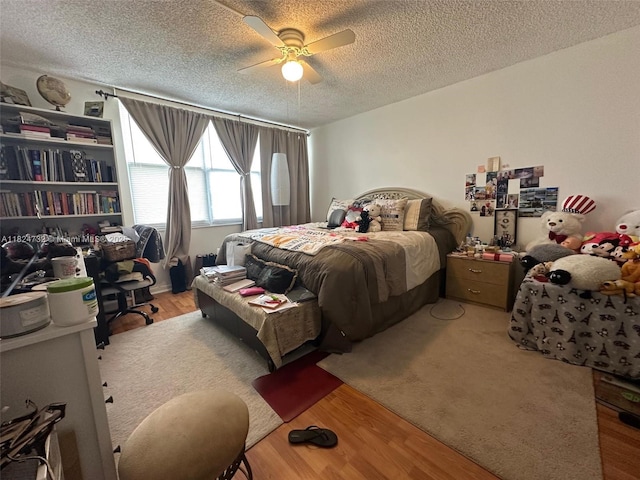 3821 Environ Blvd Unit 407, Lauderhill, FL 33319 - bedroom featuring a textured ceiling, ceiling fan, and wood finished floors
