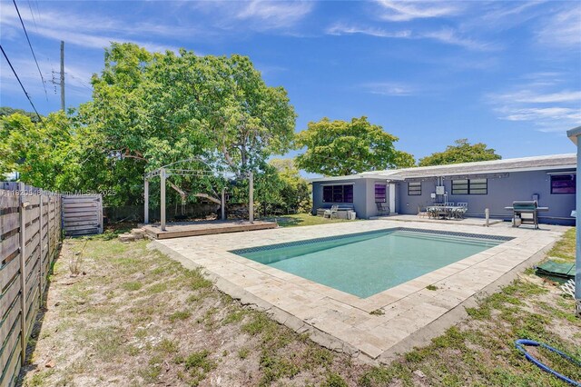 3338 Cleveland St, Hollywood, FL 33021 - view of pool featuring a fenced backyard and a patio